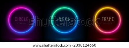 Set of blue, red-purple, green illuminate frame design. Abstract cosmic vibrant color circle backdrop. Collection of glowing neon lighting on dark background with copy space. Top view futuristic style Foto stock © 