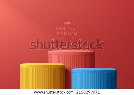 Abstract 3D room with set of steps realistic red, yellow and blue color cylinder stand podium. Minimal wall scene for mockup product display. Vector geometric forms. Stage for showcase. Vector EPS10 Foto d'archivio © 