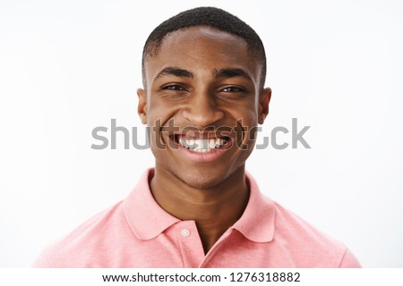 Similar – Image, Stock Photo Portrait of Handsome Black Man Turning Head Looking at Camera