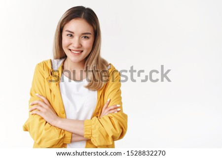 Similar – Image, Stock Photo Young blonde asian woman in knitted turtleneck sweater with fairy lights and bokeh around