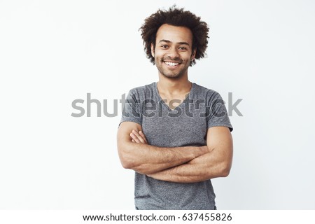 Similar – Image, Stock Photo Smiling ethnic man with headphones in city