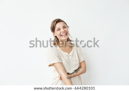 Similar – Image, Stock Photo Young woman smiling,laughing and waving hair with hands looking camera.Fresh college student nervous and excited for new university,lessons and house.Starting era and lifestyle in city,generation z