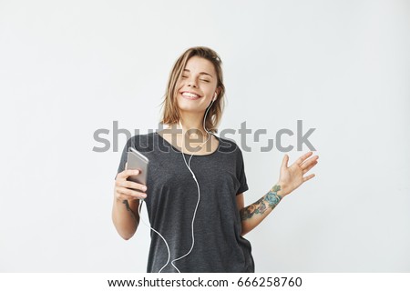 Image, Stock Photo Stylish tattooed woman on street