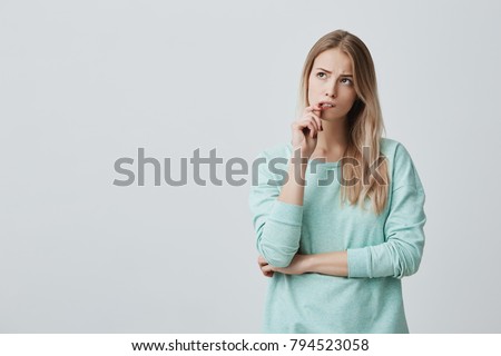 Similar – Image, Stock Photo Stylish pensive woman on chair at home