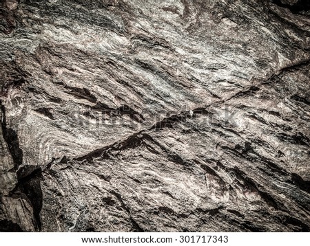 natural rock texture on the seashore  with soft vignette to create the artistic focusing effect on image