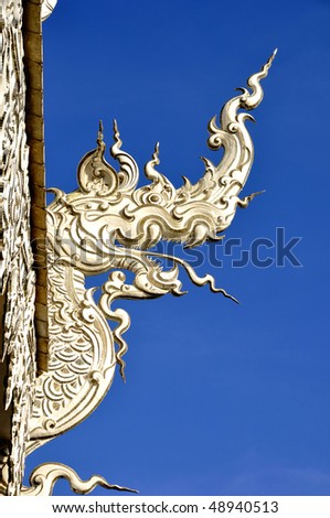 Temple dragon\'s head on the wall of the carvings