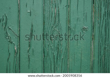 Old green wooden wall with cracked paint, background texture. High quality photo Foto d'archivio © 