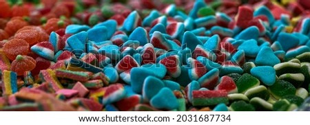 Assorted gummy candies and jellies as background. A lot of colorful jelly sweets candy flavor. Selective focus. High quality photo Stockfoto © 