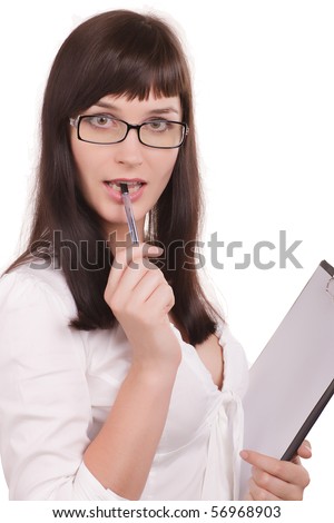 business woman in glasses with a folder and pen stands, brunette