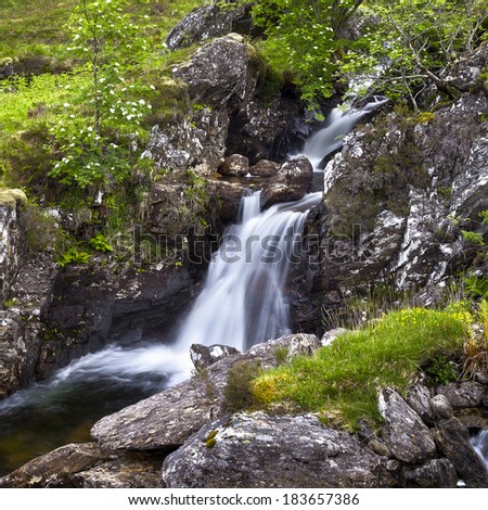 A magnificent waterfall in the Scottish back country.