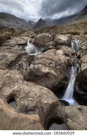 The Fairy Pools at the Isle of Skye with the Cuillin Hills in the background