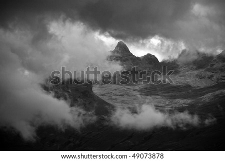 Dark heavy rainclouds moving through Bolivian Andes, Chacaltaya Range, Cordillera Real