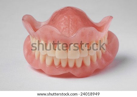 False teeth prosthetic on isolated white background