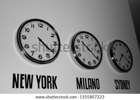 Clock on the wall showing time in the world in b/w Stock fotó © 