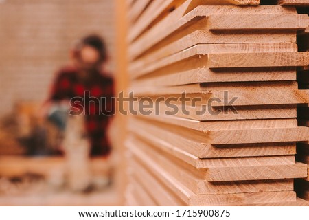 Similar – Image, Stock Photo Craftsman milling lumber using machine in carpentry workroom