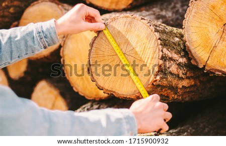 Similar – Image, Stock Photo Skilled woodworker using milling machine while working with lumber in contemporary workroom