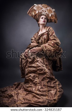 Woman in authentic designer outfit
