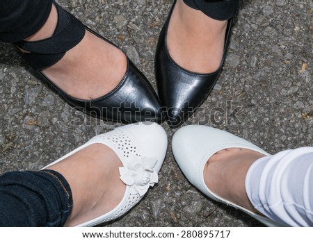 Woman feet with shoes in circle