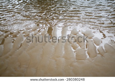 Tidal water retreats from the beach