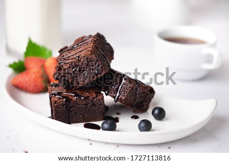 Similar – Image, Stock Photo Chocolate sauce on brownie cake