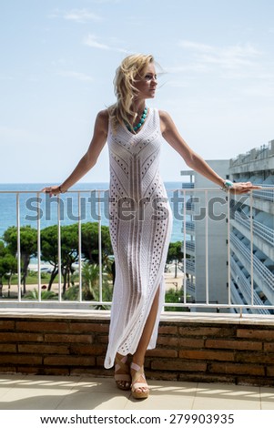 Lady in transparent  Lace Dress with turquoise jewelry