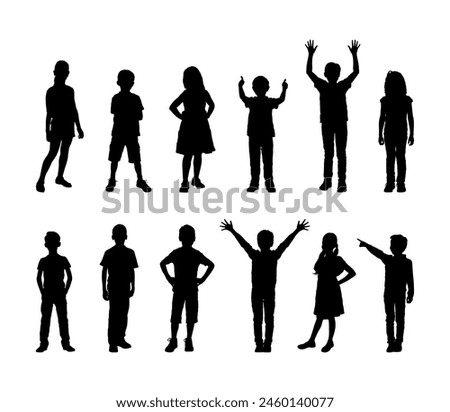 Group of kids standing in row with different poses black silhouette set.	