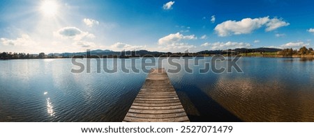 Similar – Foto Bild Bootssteg oder Badesteg aus schönem alten Holz im Sommer bei Sonnenschein am Alpsee in Schwangau bei Füssen im Allgäu im Freistaat Bayern