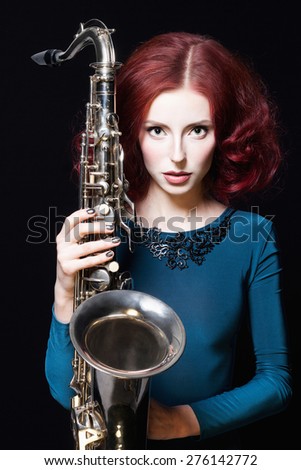 Beautiful Girl With Saxophone.Young Sexy Body Woman Play Sax.Musical ...