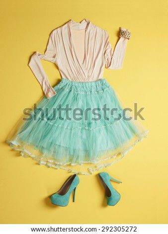 blue woman high heels shoes,skirt and blouse.beauty still life.feminine tricks