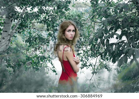 Beautiful girl in Forest. Summer Beauty blonde young woman.Russian birch