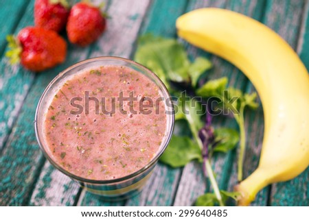 Fruit smothies with strawberries, garden stuff and banana