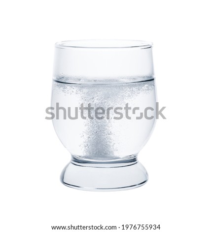 Glass with efervescent tablet in water isolated on white Imagine de stoc © 