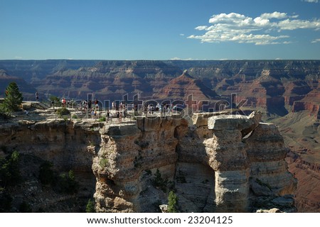 Tourists on an overlook at Grand Canyon National Park.