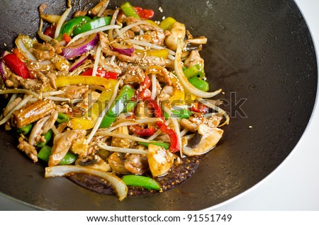 Fresh wok meal in a wok pan