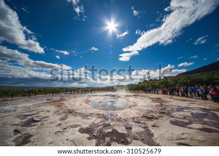 Stokkur, Iceland - July 20, 2015: Eruption, Geysir Stokkur, amazing location in the Golden Circle near Reykjavik. Erupting copiously and frequently: as often as every 4 to 8 minutes.
