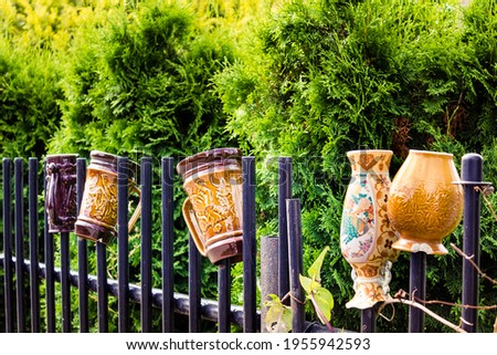 old pots on the fence of a fishing village kluki Zdjęcia stock © 