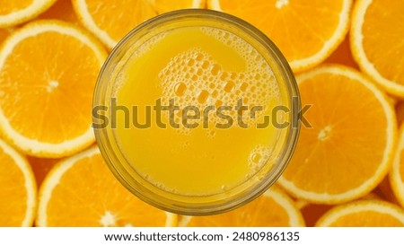 Similar – Foto Bild Frischer Saft und Mandarinen auf schwarzem Tisch