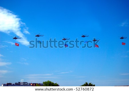 MOSCOW - MAY 9: Mi-8 banners flies during airforce parade in honor of 65th Anniversary of the WWII Victory May 9, 2010 in Moscow, Russia