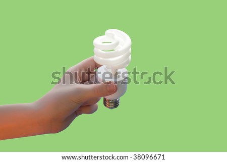 Hand holding energy saving CF light bulb off