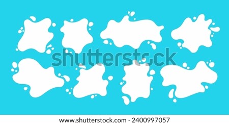 A set of blots and splashes from milk. Vector illustration in a flat style. A set of vector elements for design. Elements for natural products. 