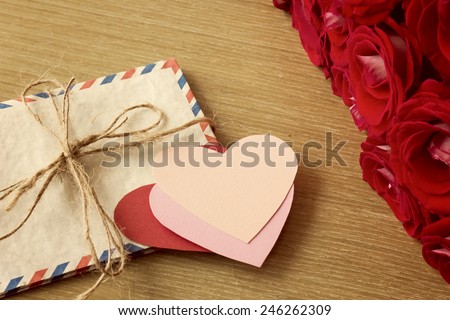 Vintage mail envelopes, roses and paper hearts
