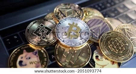 Close up cryptocurrency.Wallet coins more popular in global business economics and financial markets.Worldwide digital money and stock business.