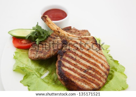 Photo of grilled meat on a plate