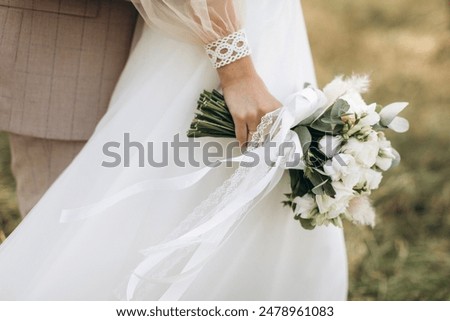 Similar – Image, Stock Photo Wedding bride hand with luxury bright dress at marriage ceremony