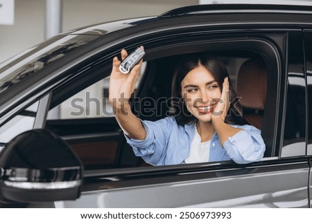 Image, Stock Photo Smiling woman sitting on bench in park with closed eyes on sunny day