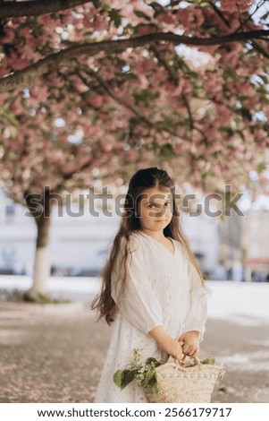 Similar – Image, Stock Photo Child stands under a pepper tree in the sun