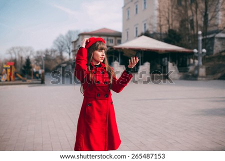 woman in red coat