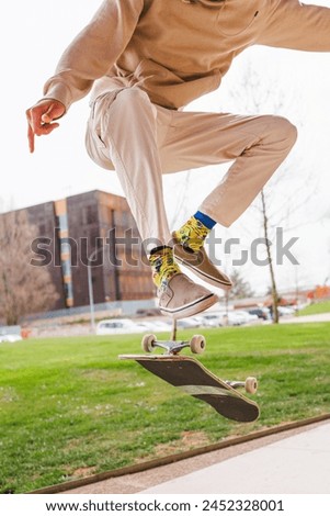 Similar – Image, Stock Photo Unrecognizable man with skateboard and backpack in city