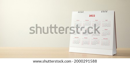 Close up 2022 calendar page dates and month background business planning appointment meeting concept
