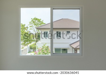 Similar – Image, Stock Photo Bedroom view. Outside it is already bright. Points of light, a curtain reminds of the night